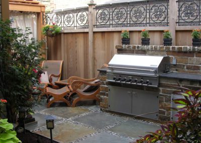 Picture of small patio grill with landscape accents