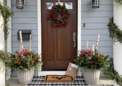 Picture of wood residential door with holiday planters